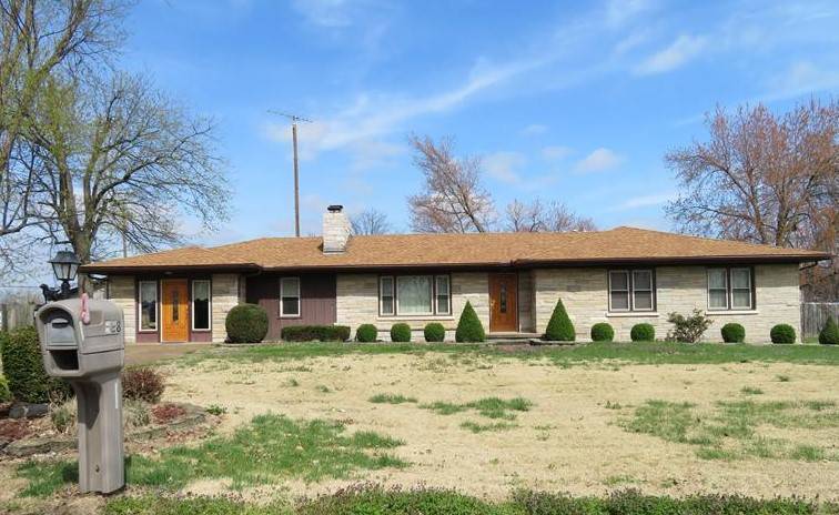 PRICED TO SELL!! Huge Bedford Stone Ranch on 1.5 Acres in Town