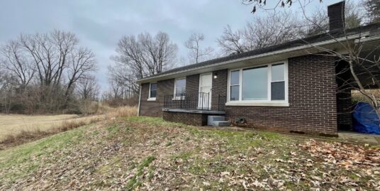 Private Location for this Brick 3 Bedroom Home in Troy!