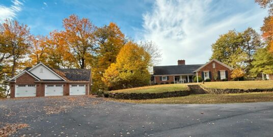 Private 23 Acre Retreat with Classic Brick Home & 3+ Car Garage