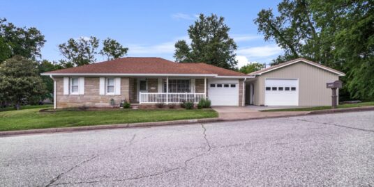 Beautiful Bedford Stone Home on corner lot