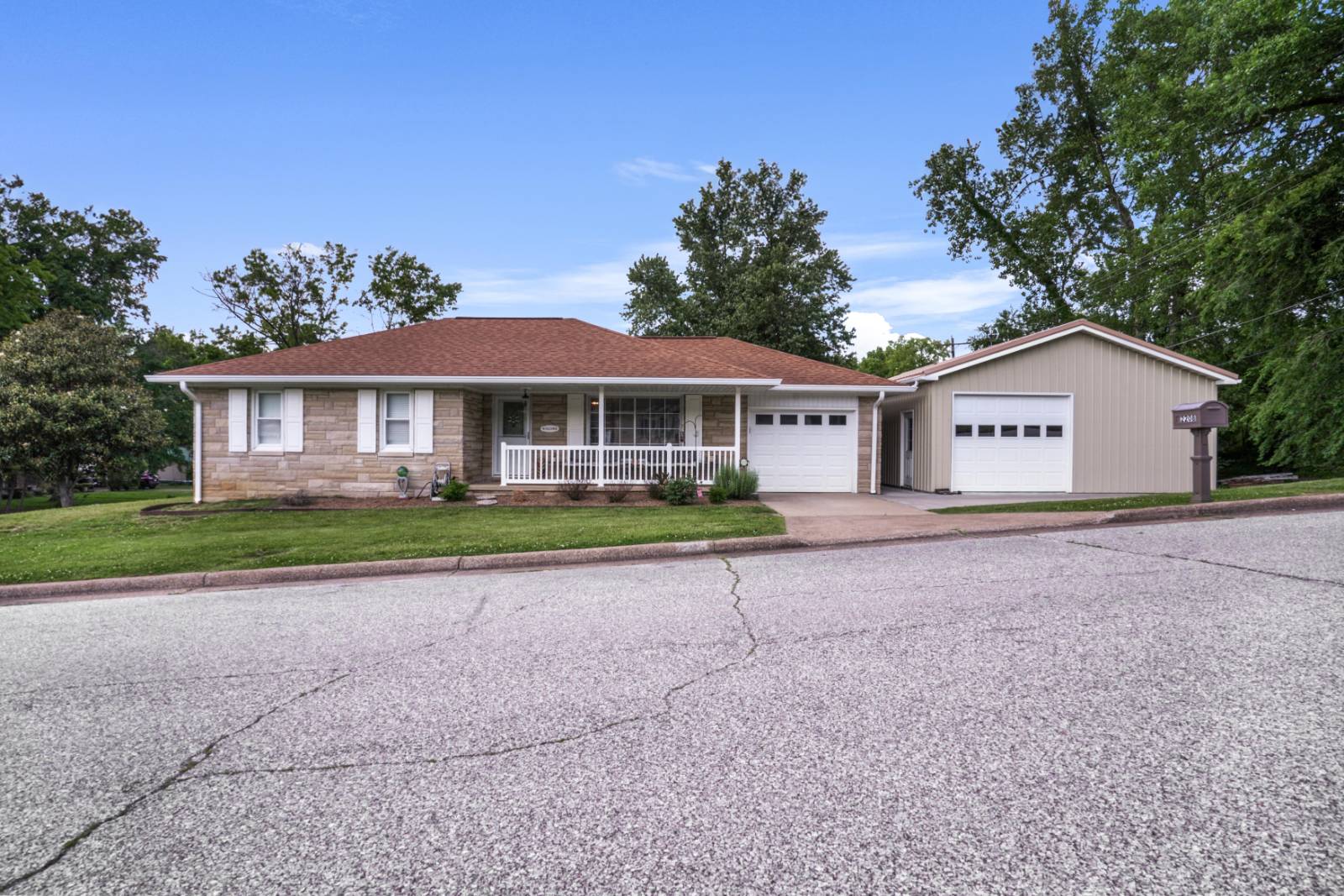 Beautiful Bedford Stone Home on corner lot